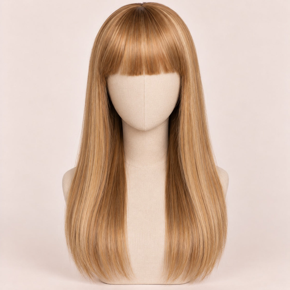Perruque blonde avec frange – sur tête de mannequin