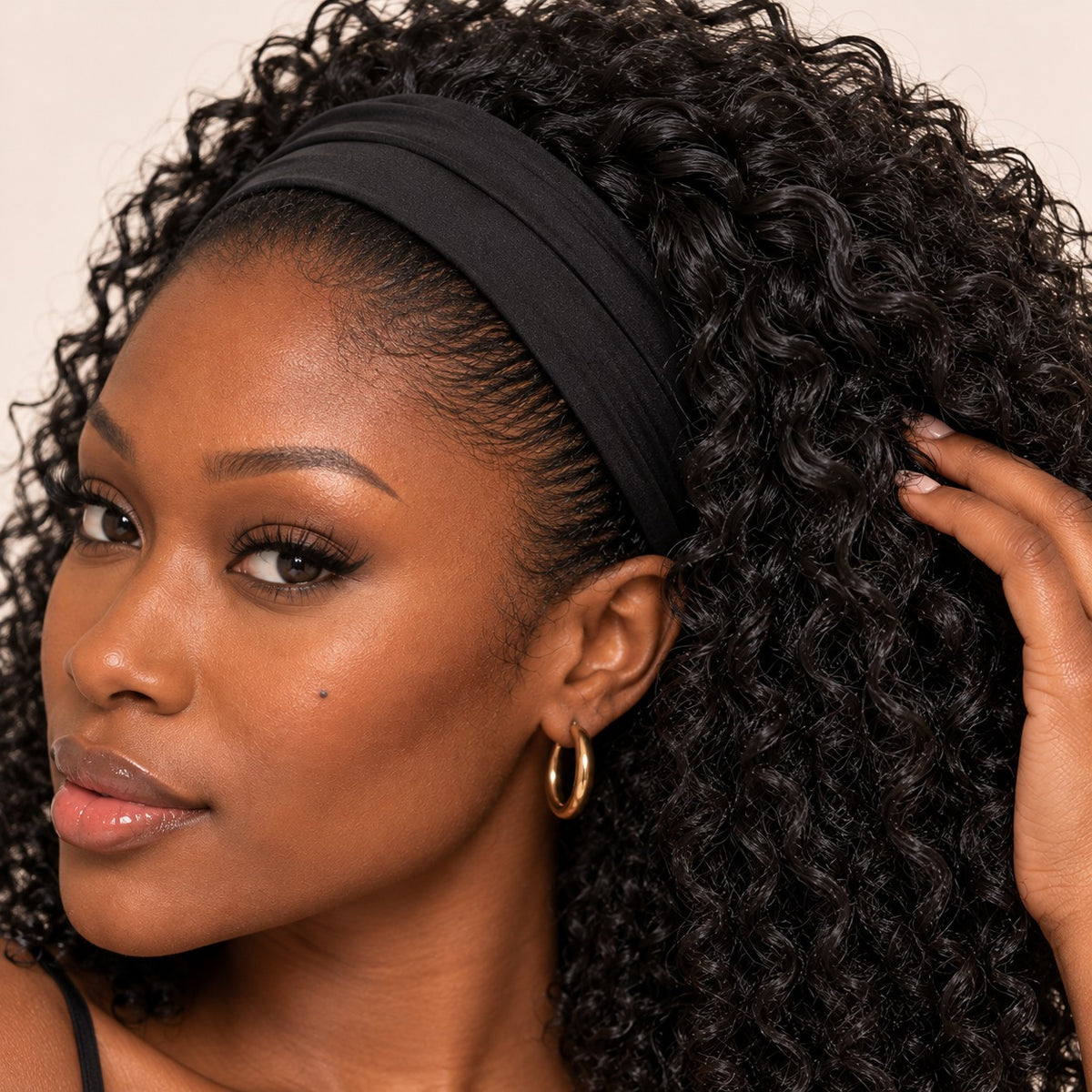 Perruque bandeau afro bouclée – ligne frontale